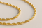 14K Yellow .90 mm Diamond-Cut Singapore Chain
