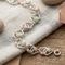 Interlink Twin Heart Bracelet, Sterling Silver, 12k Green and Rose Gold Black Hills Gold Motif, 6.75"