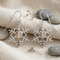 Black Hills Gold Snowflake Earrings Sterling Silver with 12k Green & Rose Gold Heart Grape Leaves Winter Snowflake Dangle Earrings