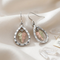 Sterling Silver Diamond-Cut Teardrop Frame Dangle Earrings with Floating 12k Green and Rose Gold Leaf Center, Black Hills Gold Fine Jewelry for Women on French Wires