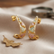 Ave 369 Diamond-Cut Semi Hoop Earrings, 10k Yellow Gold, 12k Green and Rose Gold Black Hills Gold Motif