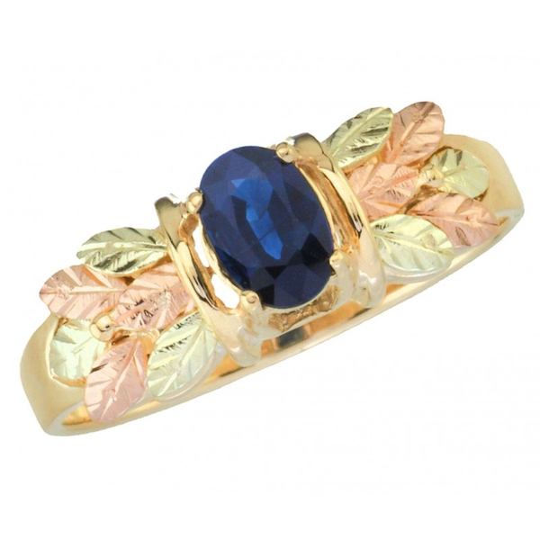 Ave 369 .53 Faceted Oval Sapphire 10k Yellow Gold with a Bouquet of 12k Green and Rose Gold Black Hills Gold Hand Sculpted Leaves